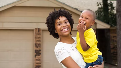 woman-holding-young-boy