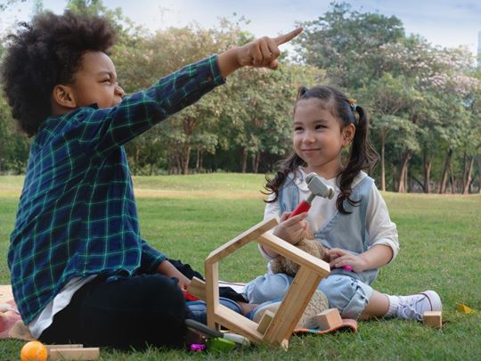 Sons and daughters month children playing outside