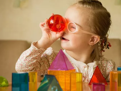 girl playing with Sensory toys